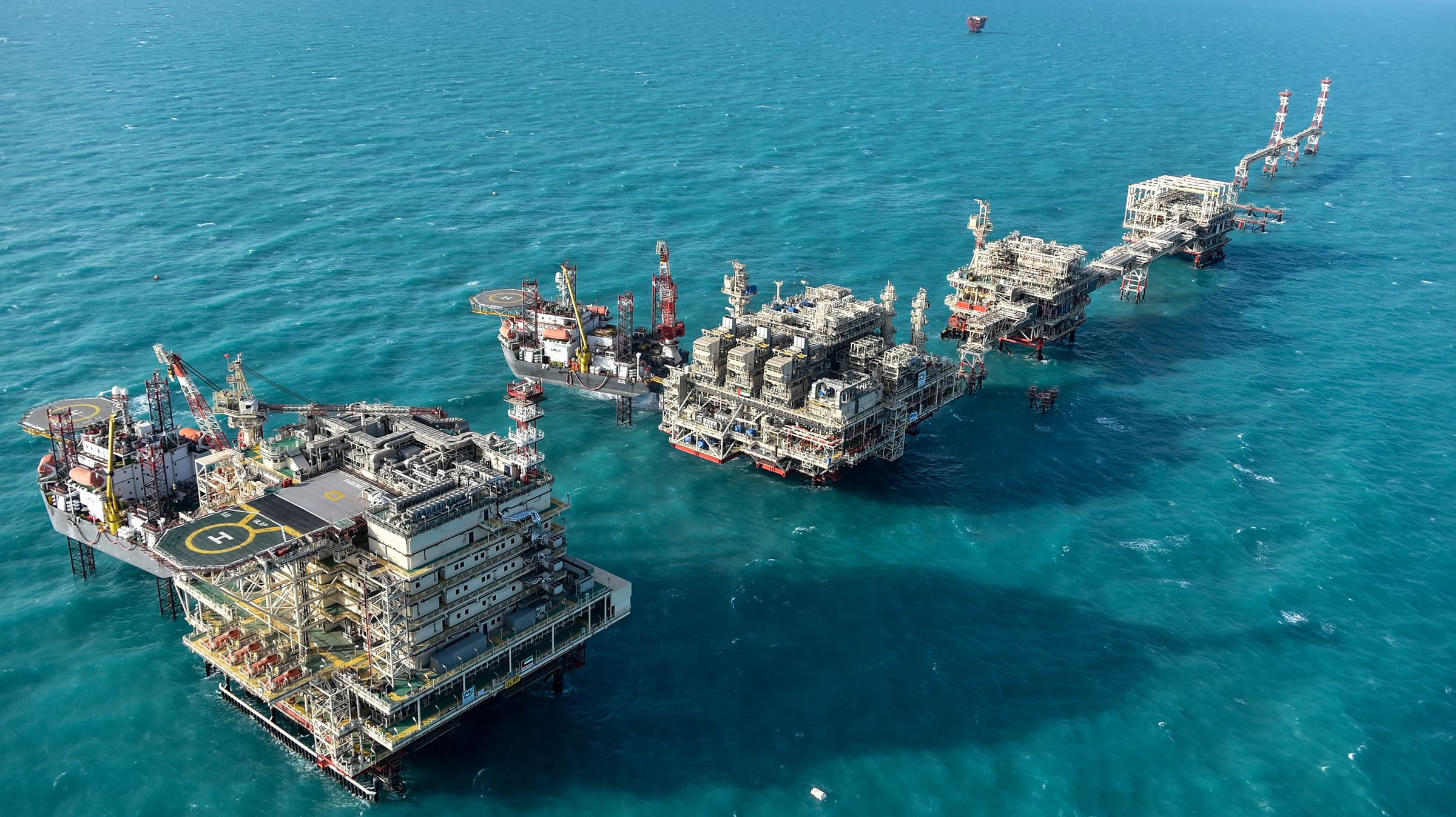 Offshore energy platforms in turquoise water