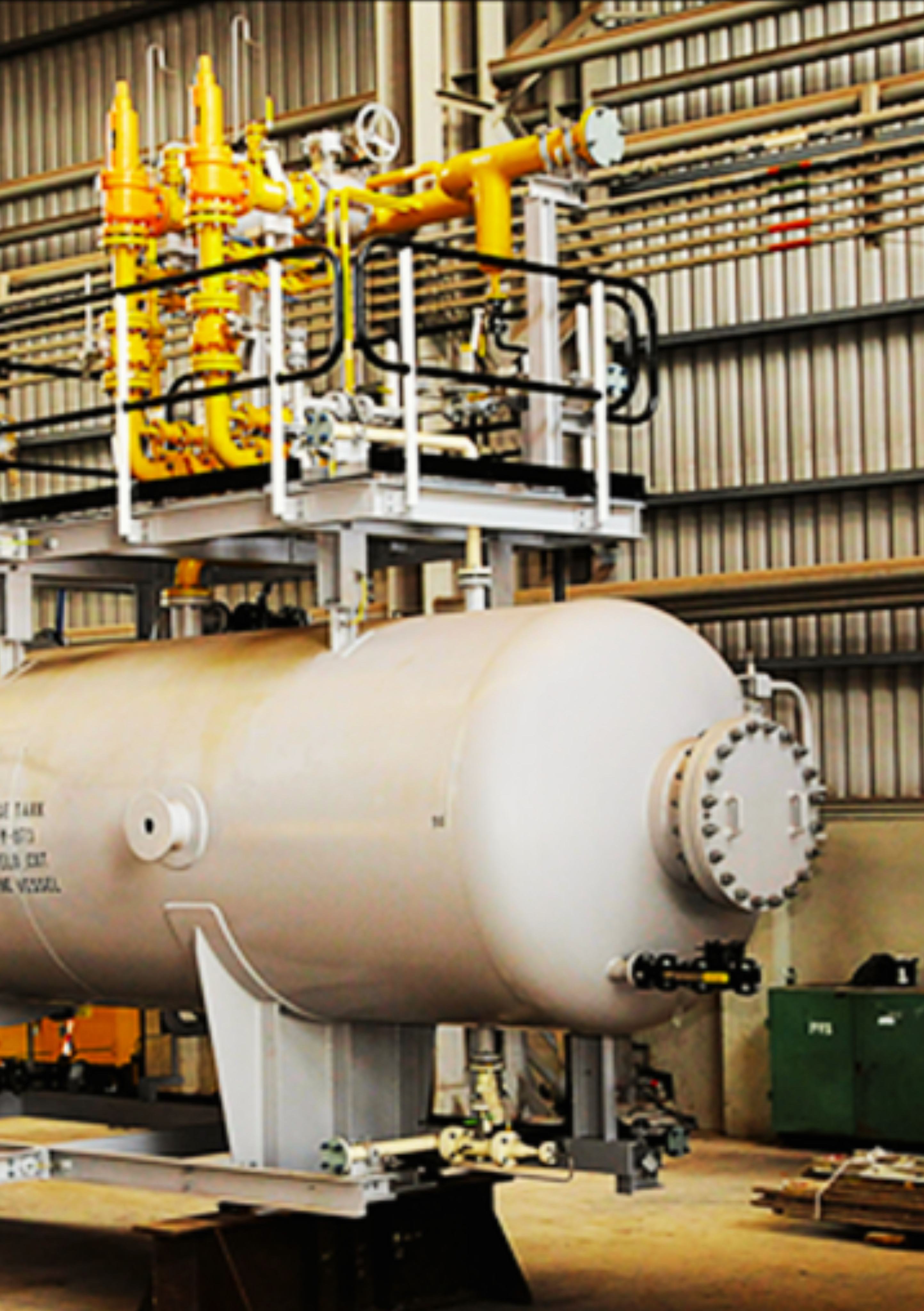 Process skid equipment mounted above a pressure vessel