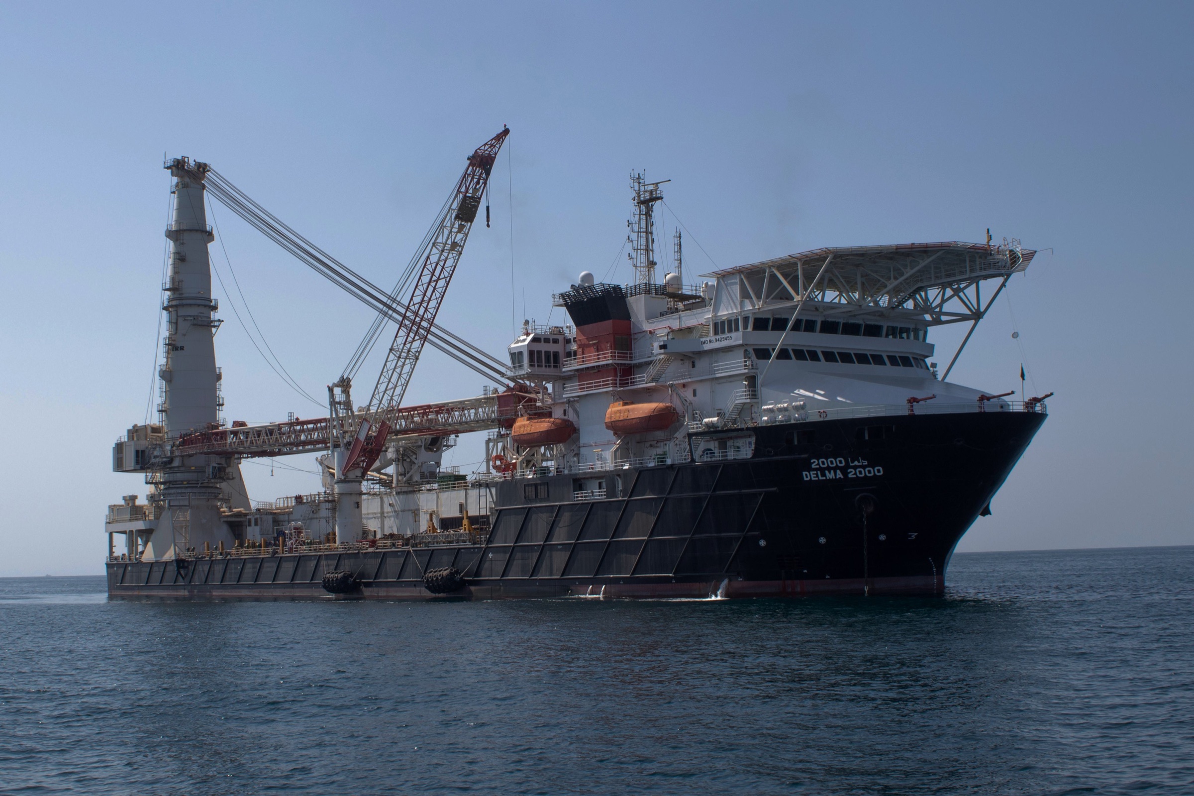 NMDC Energy construction vessel with crane at sea