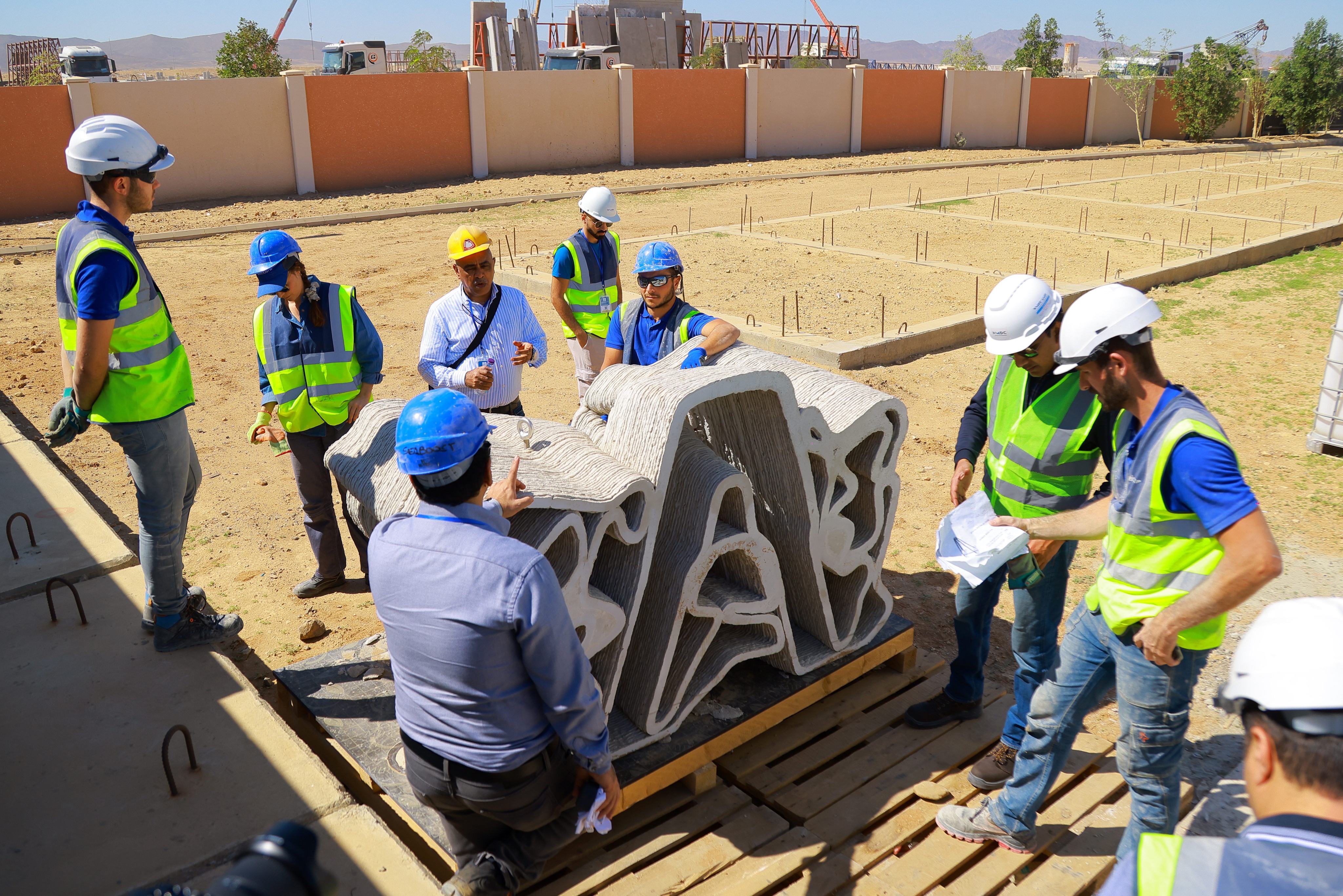 NMDC Infra team inspecting 3D printed reef structures