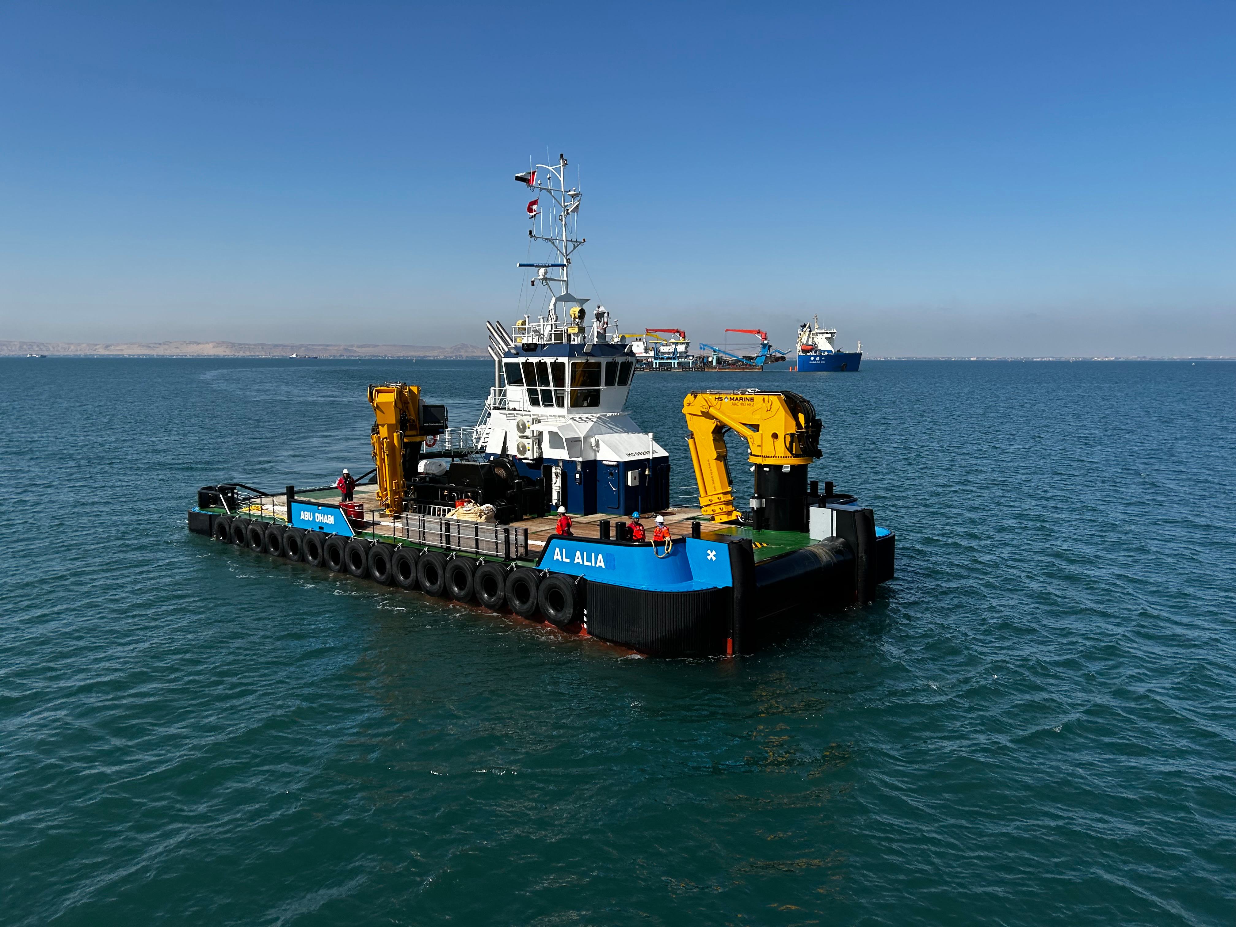Support vessel and workboat at sea
